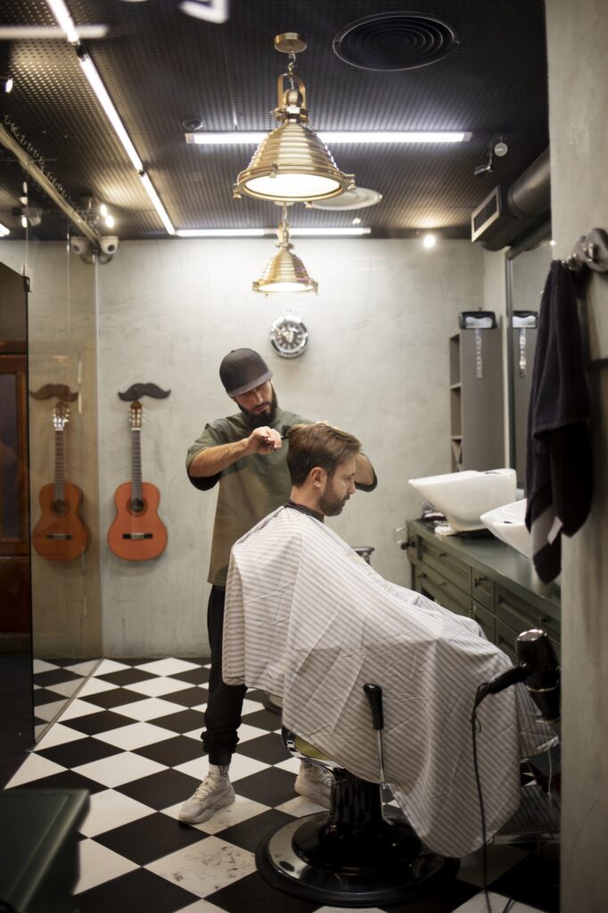 male barber giving his client nice haircut 23 2149186489 نور خطی ، لاین نوری، لاینر